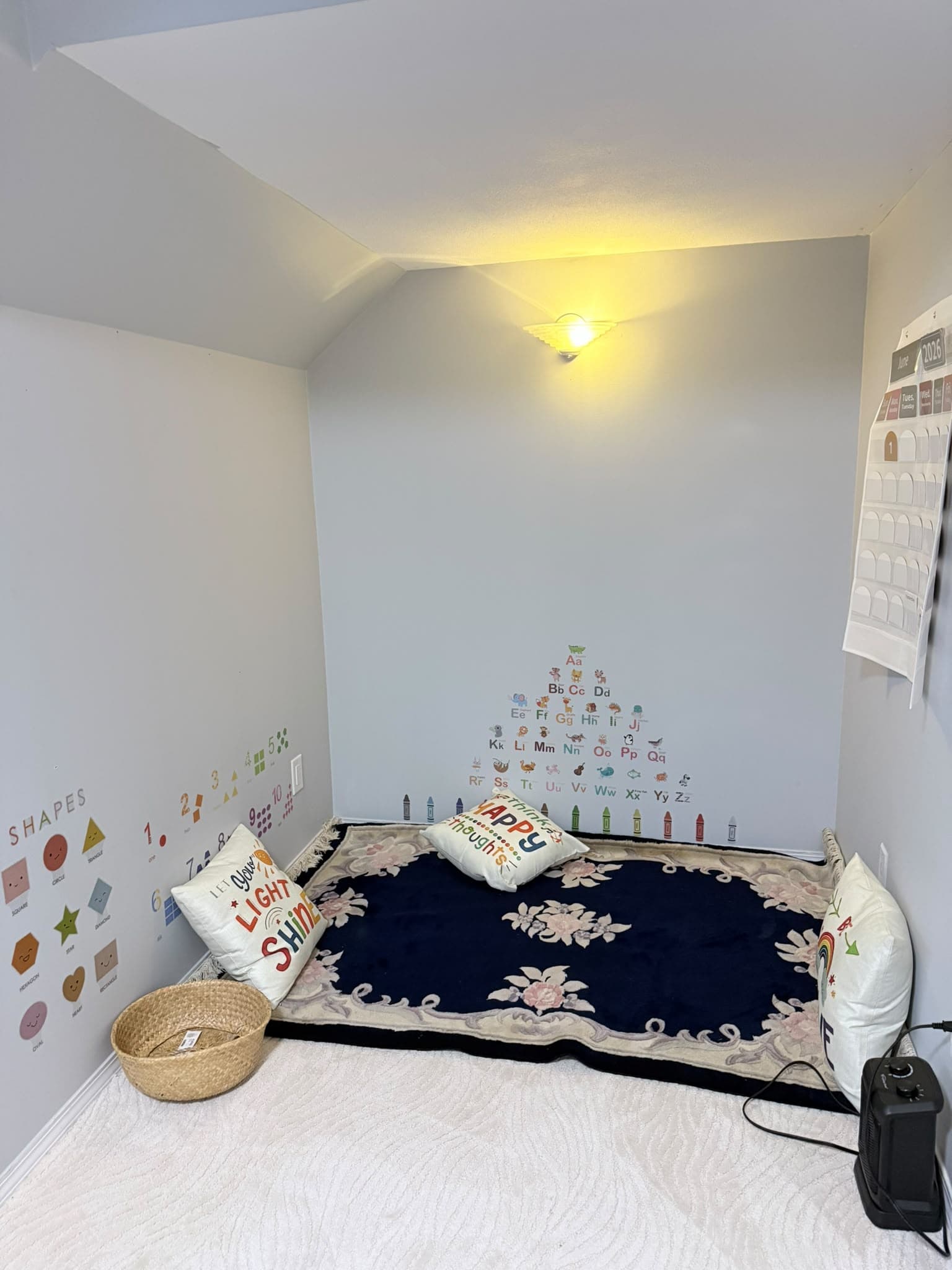 Circle time learning corner with seating and learning materials